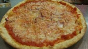 Pizza traditionnelle : pizza ronde de pizzeria, polyvalente